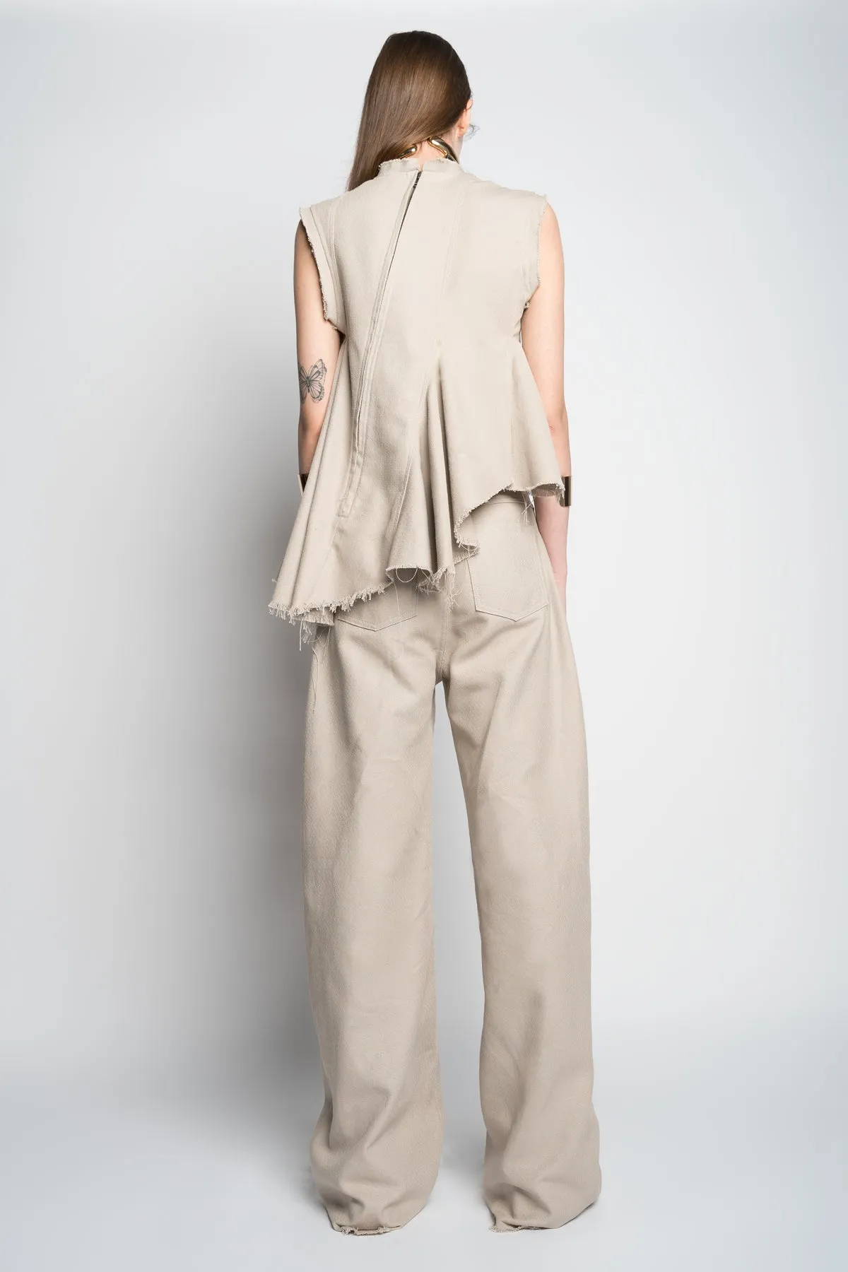 BEIGE WOVEN SLEEVELESS TOP WITH ASYMMETRIC HEM