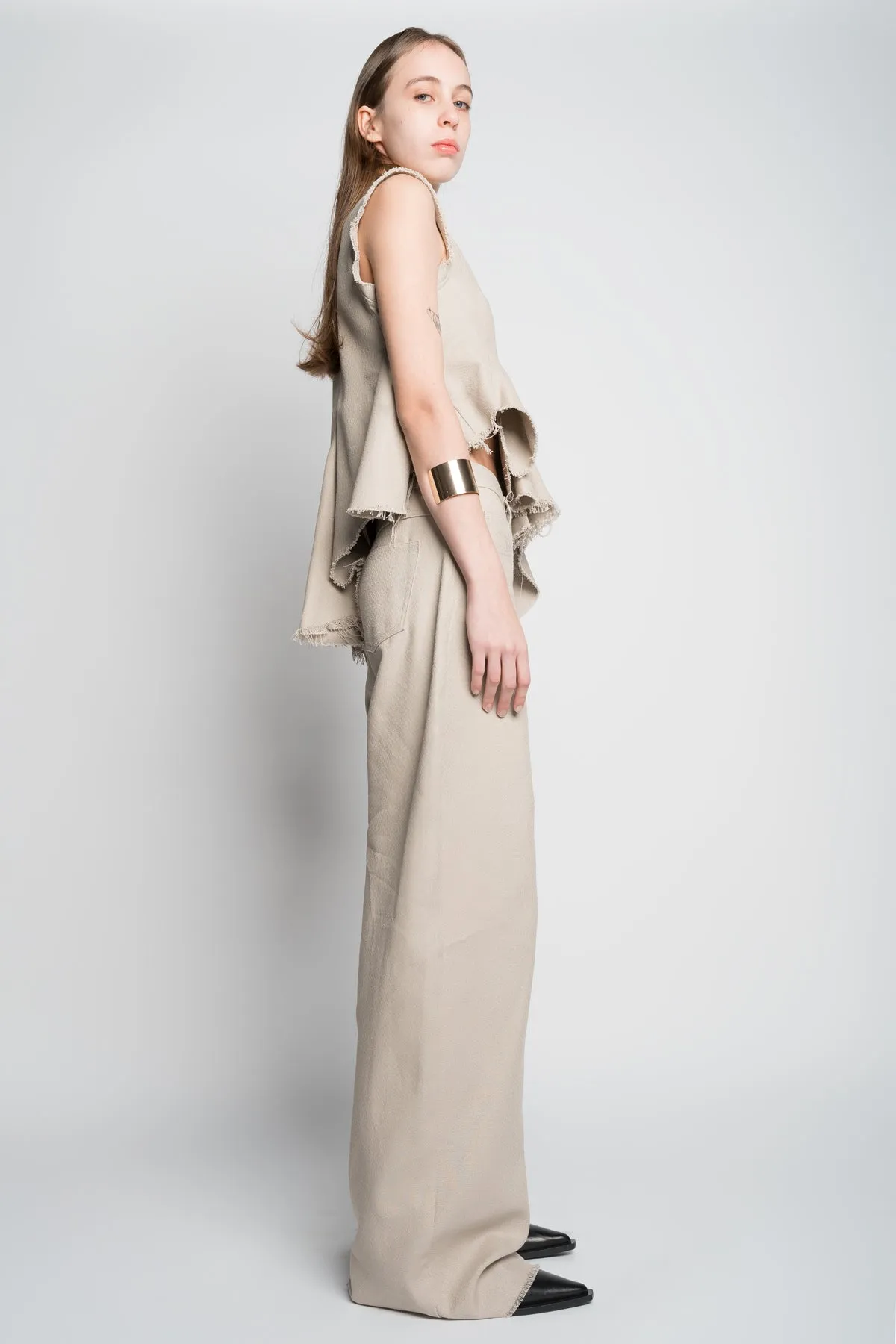 BEIGE WOVEN SLEEVELESS TOP WITH ASYMMETRIC HEM